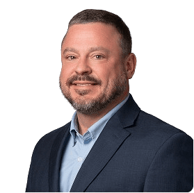The headshot of Jason LaPointe from Exostar against a blank background.