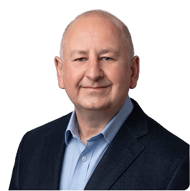 The headshot of Exostar's Stuart Wilson against a blank background.