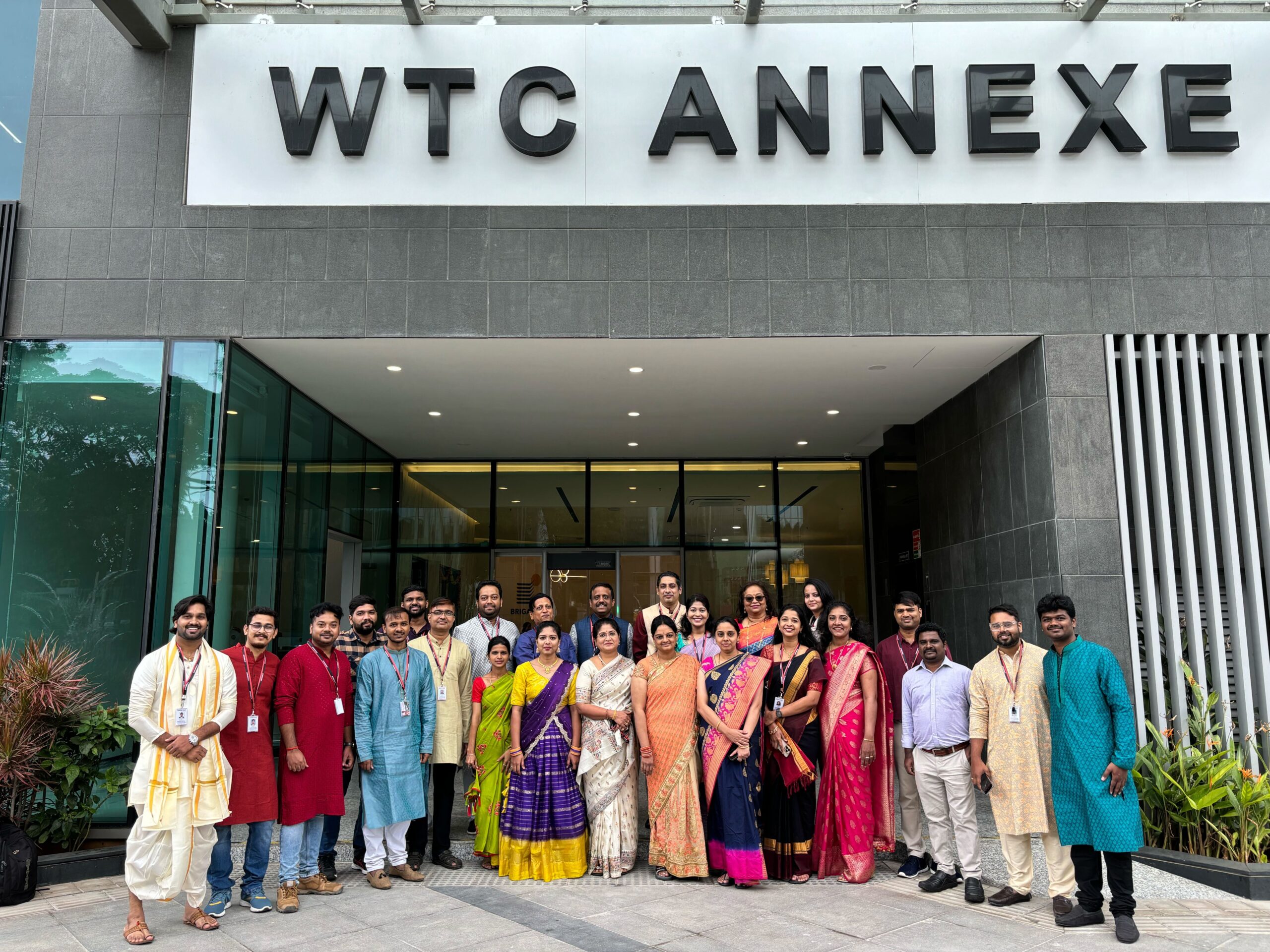 Exostar India office opening at the WTC Annexe with employees standing out front.