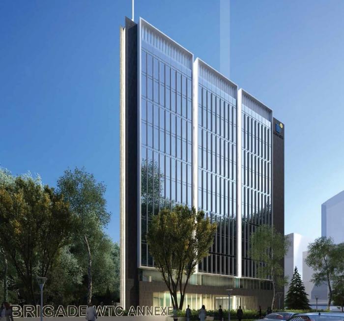 WTC Annexe building with blue skies and trees.