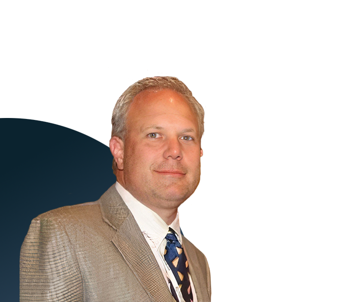 Tom Johnson, from Exostar, headshot wearing a suit against a white background.