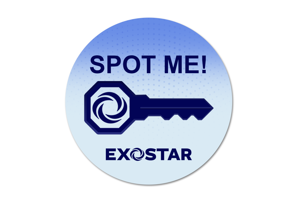 Circular pin with image of key and words 'Spot Me'